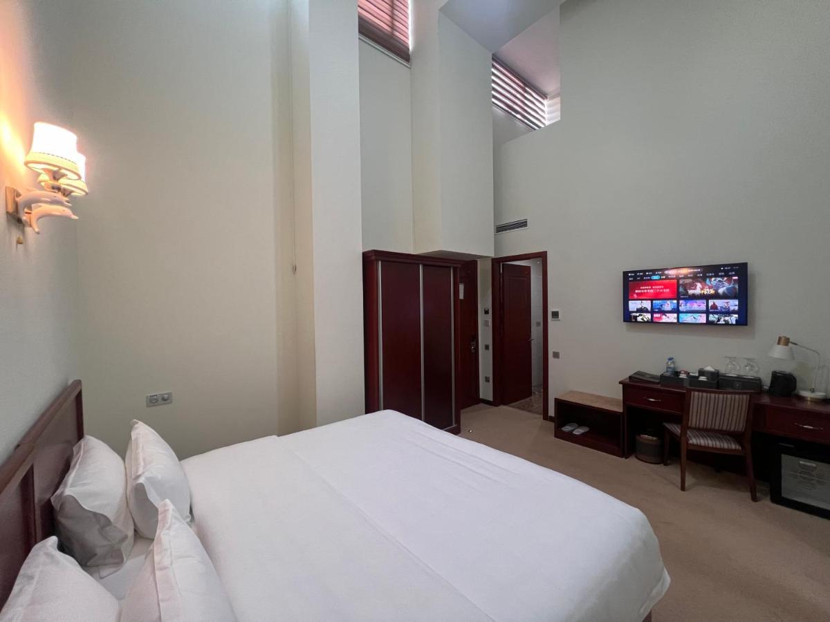 Aura Hotel Tasken Kültér fotó